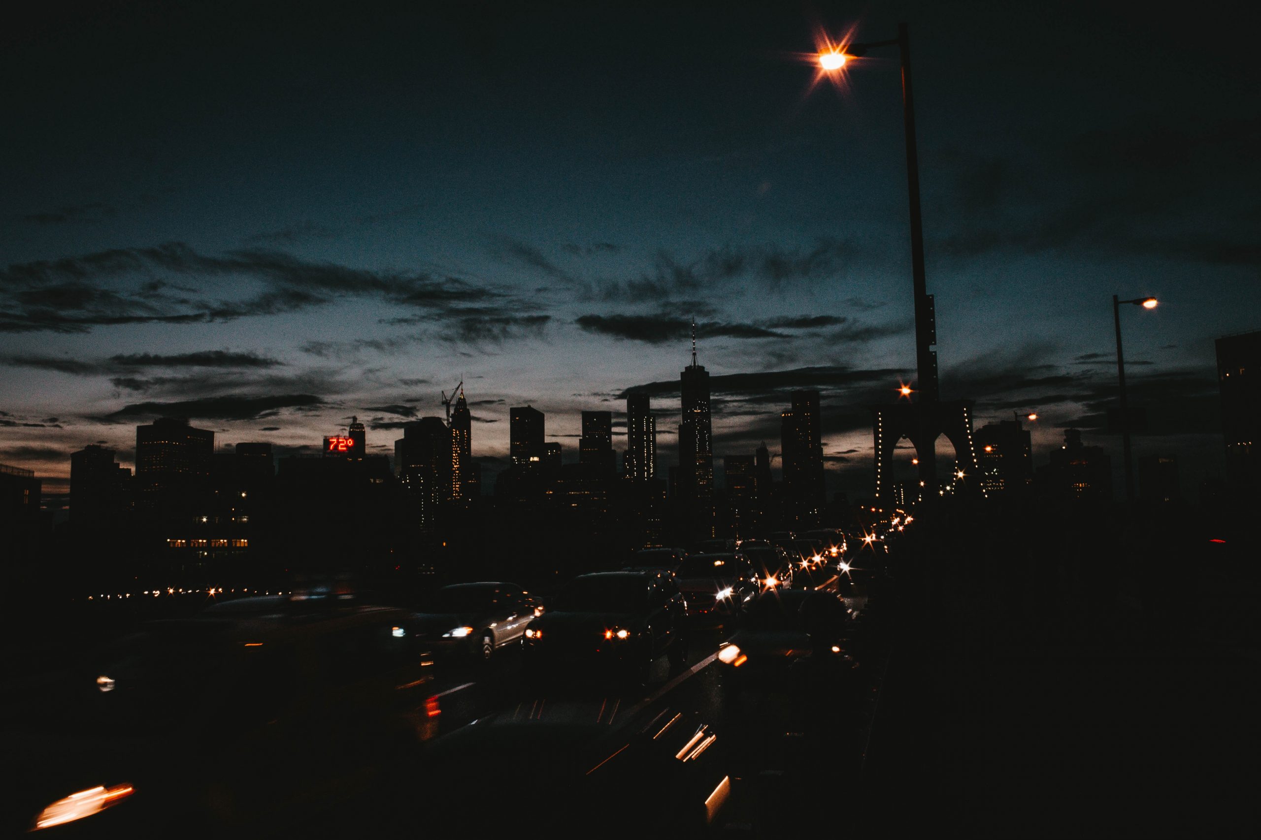 The beautiful city of Manhattan at night with cloudy sky